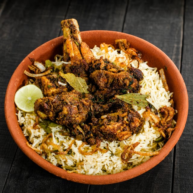 Chicken Fry Piece (Bone) Biryani.