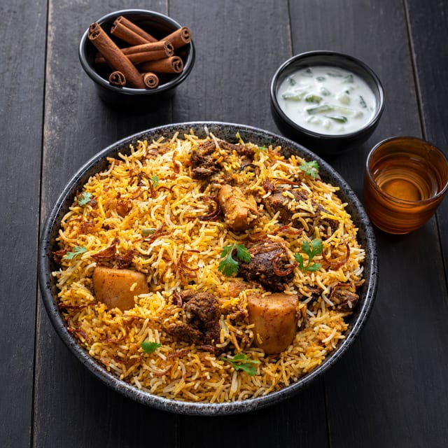 Goat Biryani (Reg).